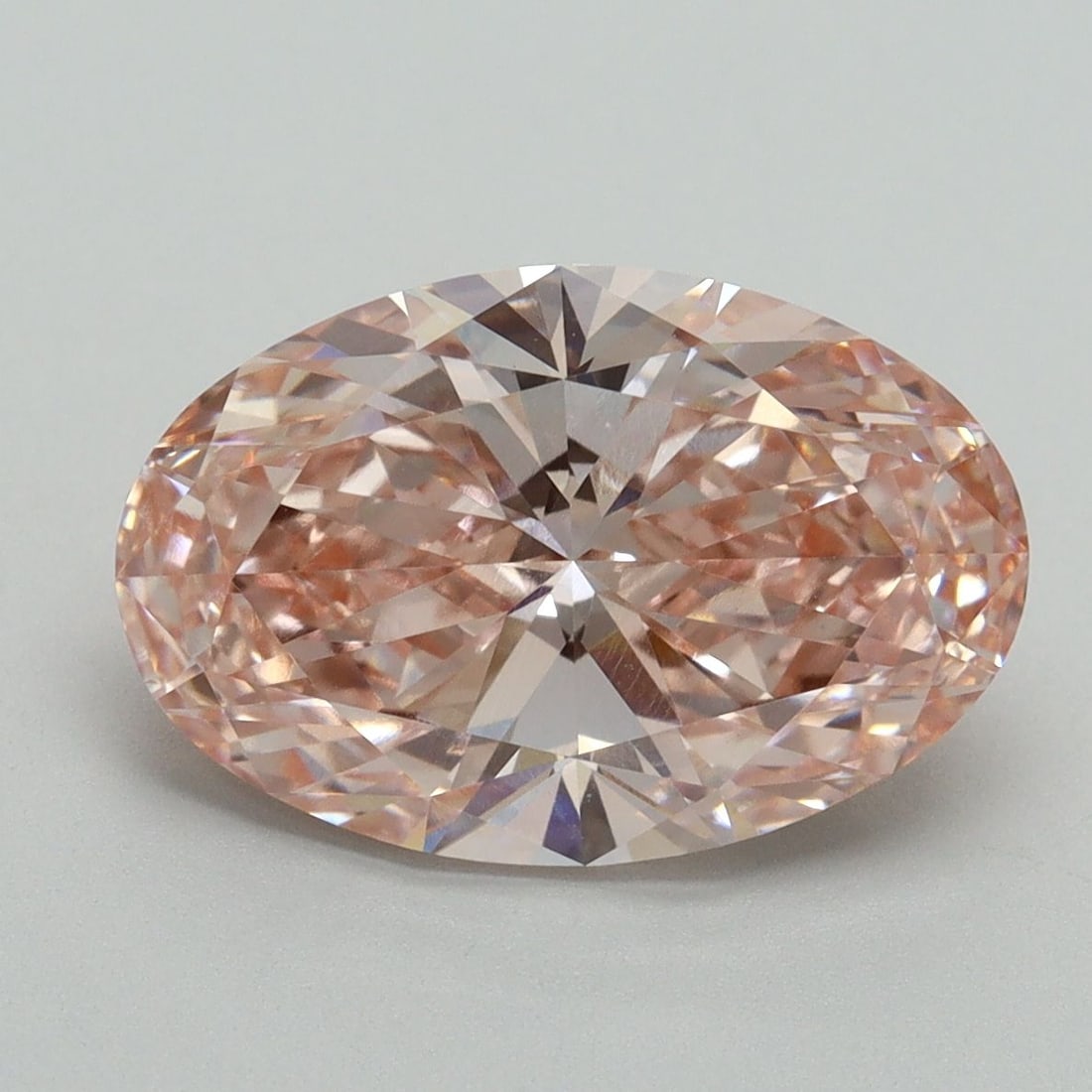 Loose Diamond - OVAL 4.0ct Fancy Vivid Pink VVS2: Loose Diamond - OVAL 4.0ct Fancy Vivid Pink VVS2 Source: This is a real non-mined Diamond that has been grown in a lab Shape: OVAL Carats: 4.0 Color: Fancy Vivid Pink Certification: IGI Video: