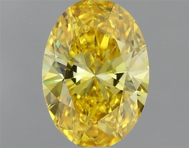 Loose Diamond - OVAL 1.11ct Fancy Vivid Yellow VS1: Loose Diamond - OVAL 1.11ct Fancy Vivid Yellow VS1 Source: This is a real non-mined Diamond that has been grown in a lab Shape: OVAL Carats: 1.11 Color: Fancy Vivid Yellow Certification: IGI Video: