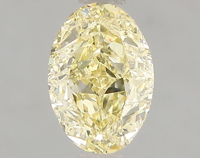 Loose Diamond - OVAL 1.52ct Fancy Vivid Yellow VS1: Loose Diamond - OVAL 1.52ct Fancy Vivid Yellow VS1 Source: This is a real non-mined Diamond that has been grown in a lab Shape: OVAL Carats: 1.52 Color: Fancy Vivid Yellow Certification: IGI Video: