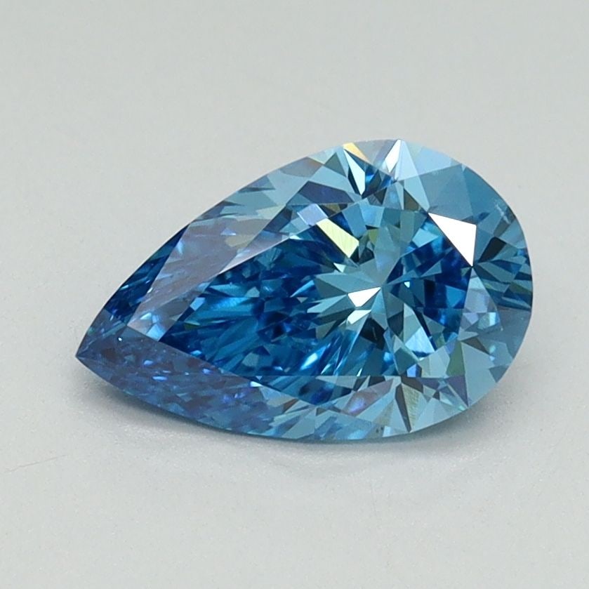 Loose Diamond - PEAR 1.02ct Fancy Vivid Blue VS2: Loose Diamond - PEAR 1.02ct Fancy Vivid Blue VS2 Source: This is a real non-mined Diamond that has been grown in a lab Shape: PEAR Carats: 1.02 Color: Fancy Vivid Blue Certification: IGI Video: