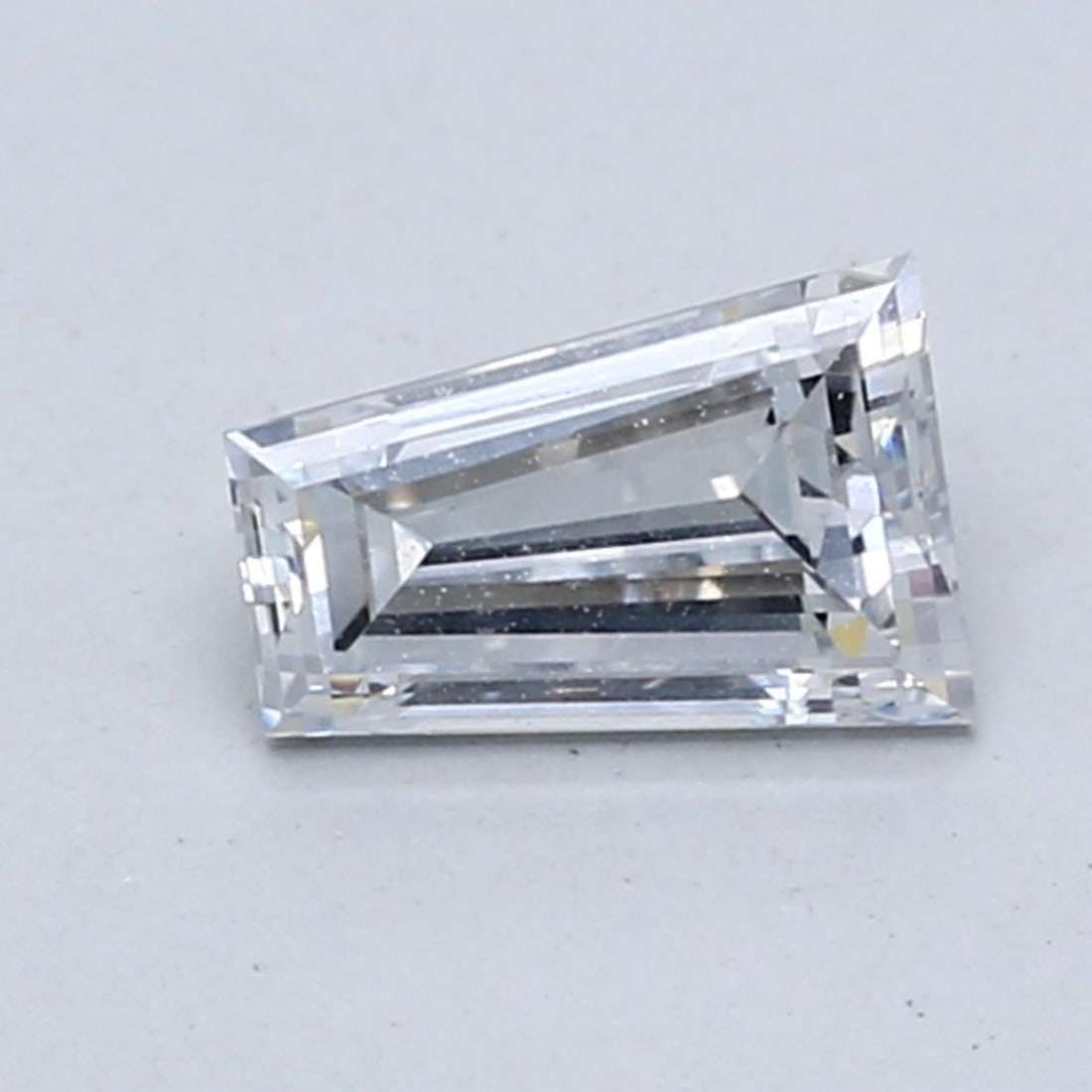Loose Diamond - TAPERED BAGUETTE 0.77ct Fancy Light Blue VS1: Loose Diamond - TAPERED BAGUETTE 0.77ct Fancy Light Blue VS1 Source: This is a real non-mined Diamond that has been grown in a lab Shape: TAPERED BAGUETTE Carats: 0.77 Color: Fancy Light Blue