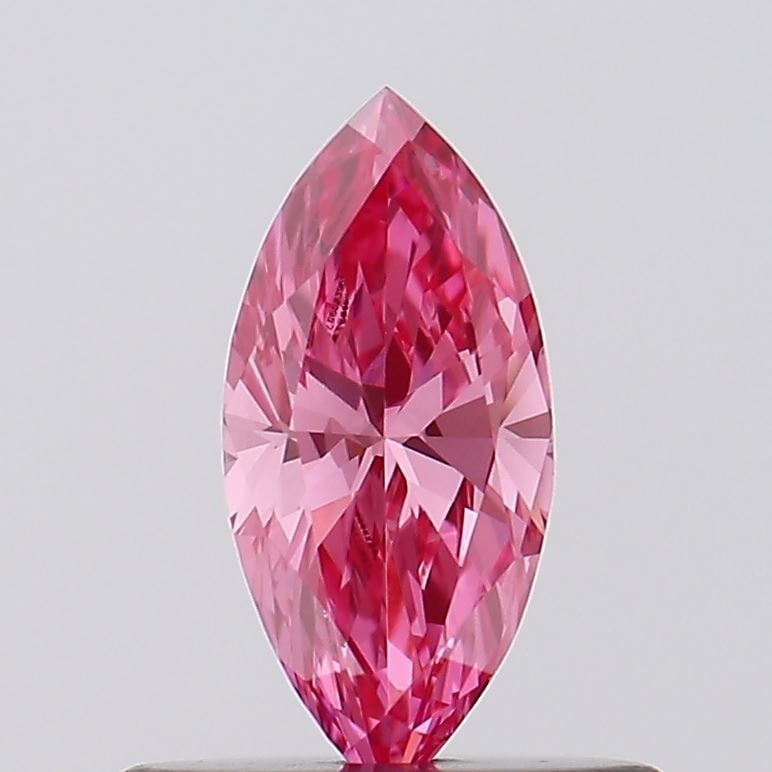 Loose Diamond - MARQUISE 0.35ct Fancy Vivid Pink VVS2: Loose Diamond - MARQUISE 0.35ct Fancy Vivid Pink VVS2 Source: This is a real non-mined Diamond that has been grown in a lab Shape: MARQUISE Carats: 0.35 Color: Fancy Vivid Pink Certification: IGI Vide