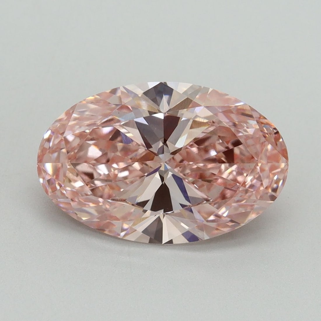 Loose Diamond - OVAL 3.05ct Fancy Vivid Pink VS1: Loose Diamond - OVAL 3.05ct Fancy Vivid Pink VS1 Source: This is a real non-mined Diamond that has been grown in a lab Shape: OVAL Carats: 3.05 Color: Fancy Vivid Pink Certification: IGI Video: