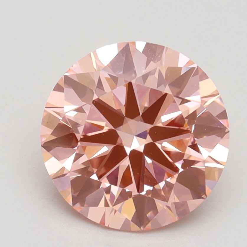 Ideal Loose Diamond - ROUND 2.28ct Fancy Vivid Pink VS1: Ideal Loose Diamond - ROUND 2.28ct Fancy Vivid Pink VS1 Source: This is a real non-mined Diamond that has been grown in a lab Shape: ROUND Carats: 2.28 Color: Fancy Vivid Pink Certification: IGI Video