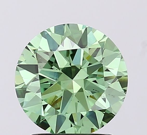 Loose Diamond - ROUND 1.54ct Fancy Vivid Green VS2: Loose Diamond - ROUND 1.54ct Fancy Vivid Green VS2 Source: This is a real non-mined Diamond that has been grown in a lab Shape: ROUND Carats: 1.54 Color: Fancy Vivid Green Certification: IGI Video: