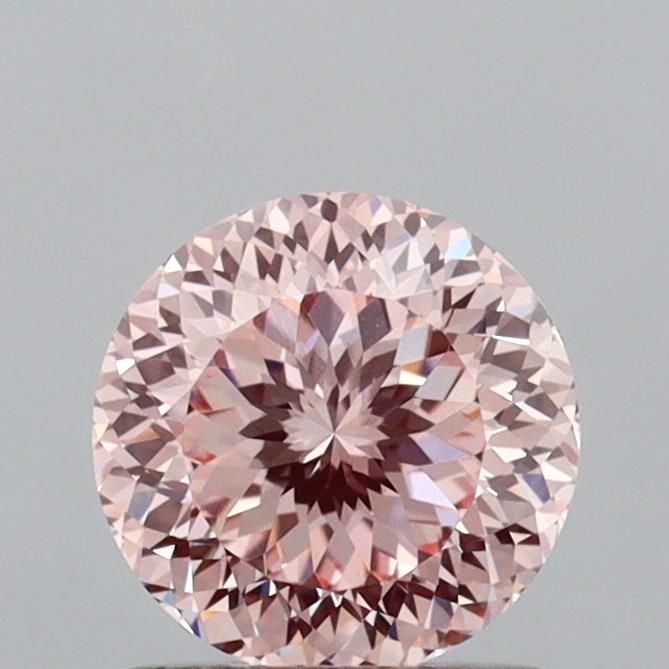 Loose Diamond - ROUND 1.09ct Fancy Pink VVS2: Loose Diamond - ROUND 1.09ct Fancy Pink VVS2 Source: This is a real non-mined Diamond that has been grown in a lab Shape: ROUND Carats: 1.09 Color: Fancy Pink Certification: IGI Video:
