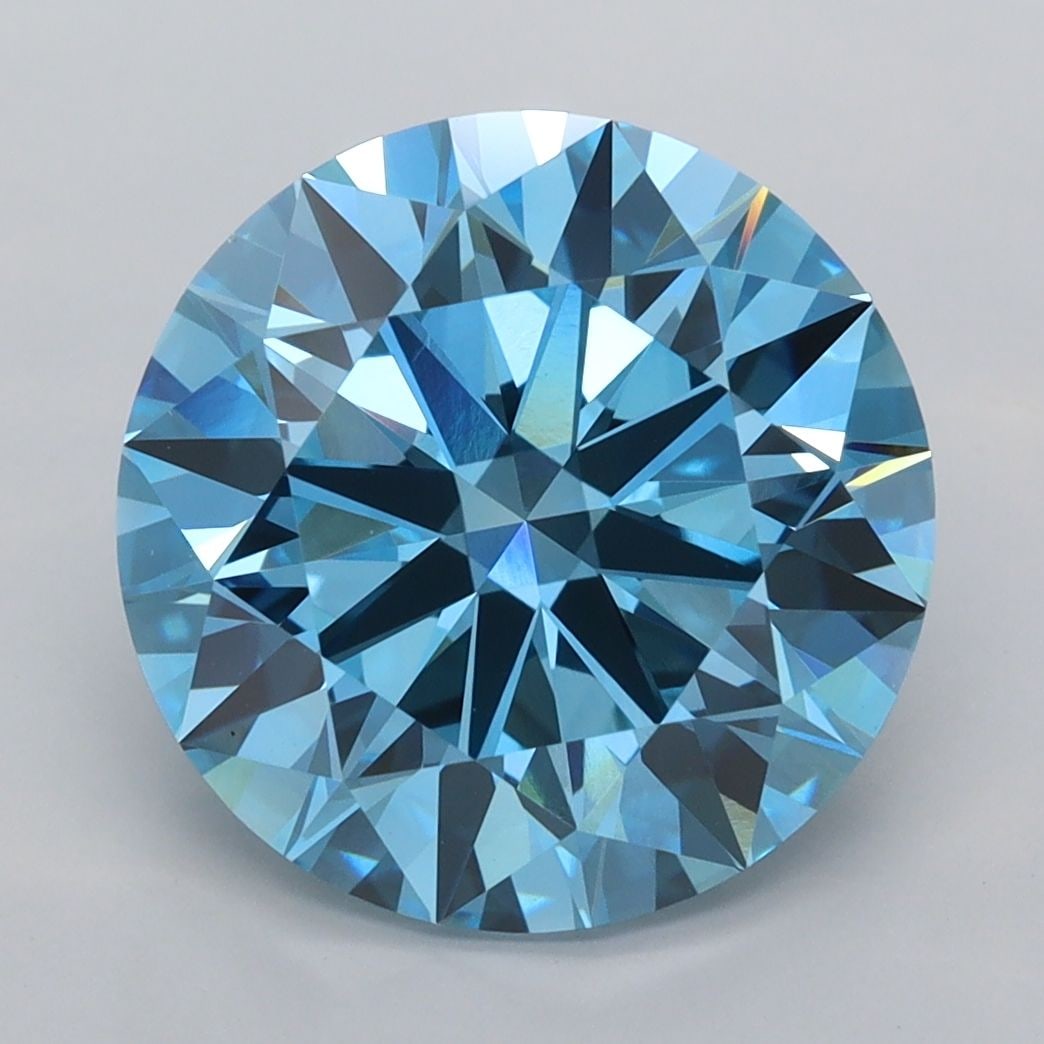 Ideal Loose Diamond - ROUND 5.04ct Fancy Vivid Blue VVS1: Ideal Loose Diamond - ROUND 5.04ct Fancy Vivid Blue VVS1 Source: This is a real non-mined Diamond that has been grown in a lab Shape: ROUND Carats: 5.04 Color: Fancy Vivid Blue Certification: IGI Vide