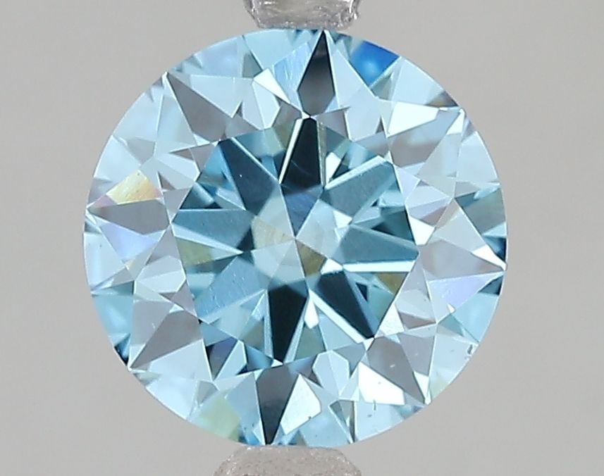 Ideal Loose Diamond - ROUND 2.1ct Fancy Vivid Blue VS2: Ideal Loose Diamond - ROUND 2.1ct Fancy Vivid Blue VS2 Source: This is a real non-mined Diamond that has been grown in a lab Shape: ROUND Carats: 2.1 Color: Fancy Vivid Blue Certification: IGI Video: