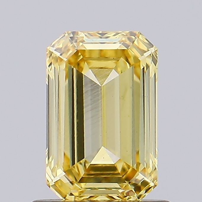 Loose Diamond - EMERALD 0.93ct Fancy Vivid Yellow VS2: Loose Diamond - EMERALD 0.93ct Fancy Vivid Yellow VS2 Source: This is a real non-mined Diamond that has been grown in a lab Shape: EMERALD Carats: 0.93 Color: Fancy Vivid Yellow Certification: NONE Vi