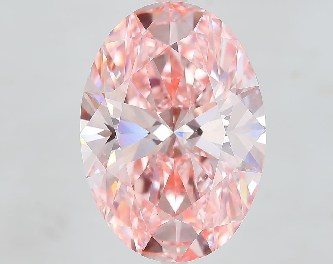 Loose Diamond - OVAL 10.79ct Fancy Vivid Pink VS1: Loose Diamond - OVAL 10.79ct Fancy Vivid Pink VS1 Source: This is a real non-mined Diamond that has been grown in a lab Shape: OVAL Carats: 10.79 Color: Fancy Vivid Pink Certification: IGI Video: