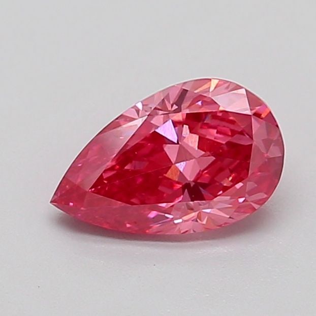 Loose Diamond - PEAR 0.79ct Fancy Vivid Pink VVS2: Loose Diamond - PEAR 0.79ct Fancy Vivid Pink VVS2 Source: This is a real non-mined Diamond that has been grown in a lab Shape: PEAR Carats: 0.79 Color: Fancy Vivid Pink Certification: IGI Video: