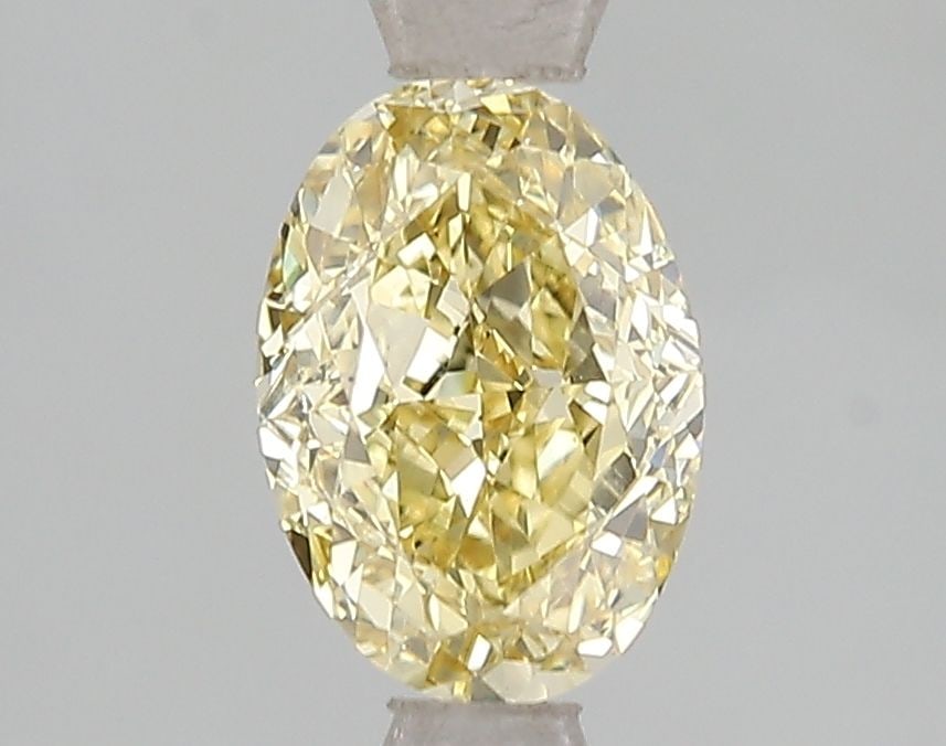 Loose Diamond - OVAL 1.52ct Fancy Intense Yellow VS1: Loose Diamond - OVAL 1.52ct Fancy Intense Yellow VS1 Source: This is a real non-mined Diamond that has been grown in a lab Shape: OVAL Carats: 1.52 Color: Fancy Intense Yellow Certification: IGI Video