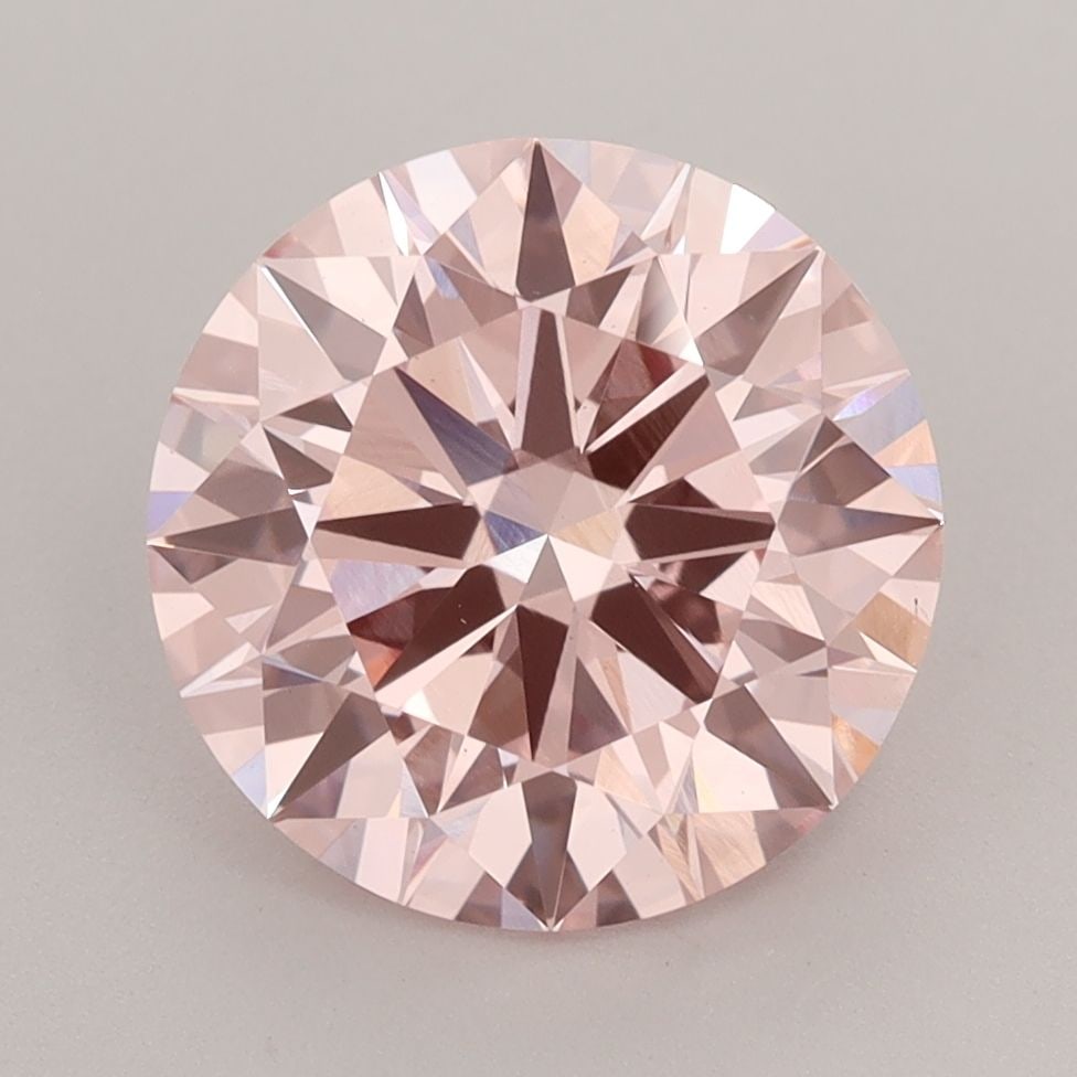 Ideal Loose Diamond - ROUND 3.04ct Fancy Vivid Pink VS1: Ideal Loose Diamond - ROUND 3.04ct Fancy Vivid Pink VS1 Source: This is a real non-mined Diamond that has been grown in a lab Shape: ROUND Carats: 3.04 Color: Fancy Vivid Pink Certification: IGI Video