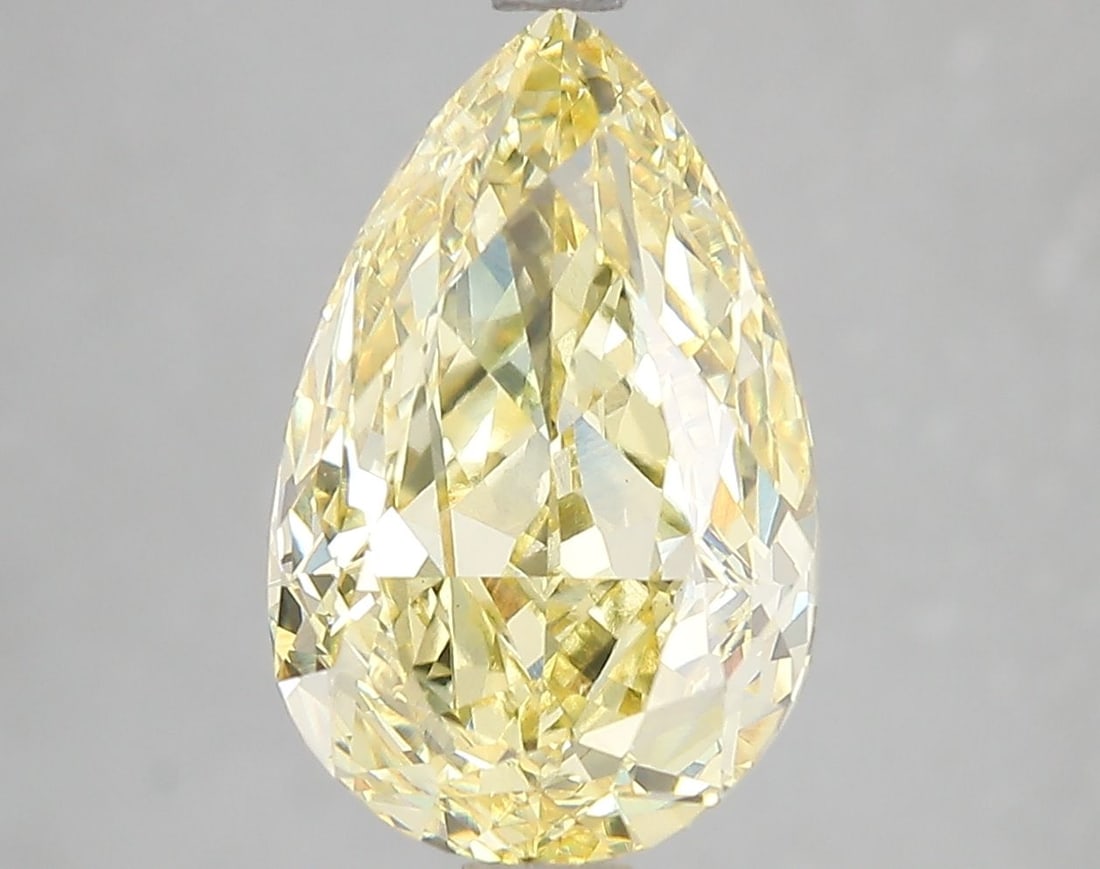 Loose Diamond - PEAR 5.06ct Fancy Vivid Yellow VS2: Loose Diamond - PEAR 5.06ct Fancy Vivid Yellow VS2 Source: This is a real non-mined Diamond that has been grown in a lab Shape: PEAR Carats: 5.06 Color: Fancy Vivid Yellow Certification: IGI Video: