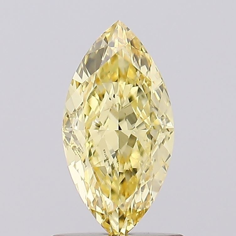 Loose Diamond - MARQUISE 1.04ct Fancy Yellow VVS2: Loose Diamond - MARQUISE 1.04ct Fancy Yellow VVS2 Source: This is a real non-mined Diamond that has been grown in a lab Shape: MARQUISE Carats: 1.04 Color: Fancy Yellow Certification: IGI Video:
