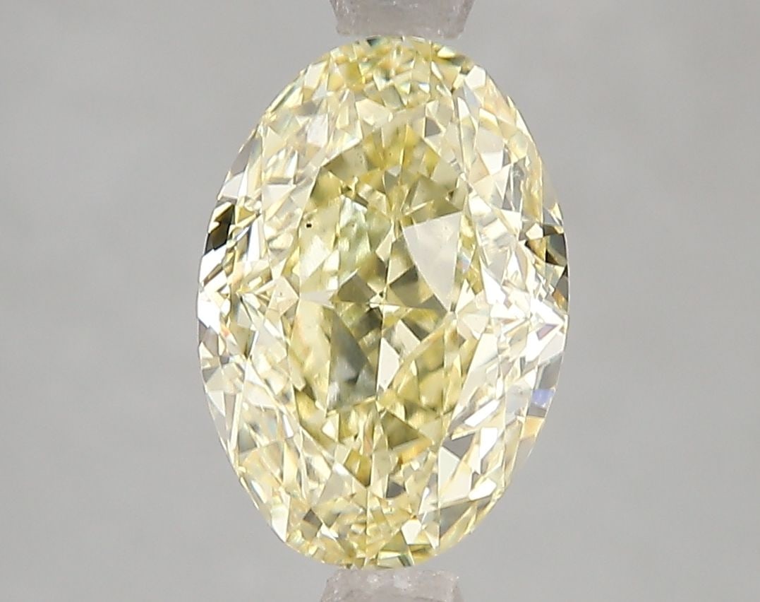 Loose Diamond - OVAL 3.03ct Fancy Intense Yellow VS2: Loose Diamond - OVAL 3.03ct Fancy Intense Yellow VS2 Source: This is a real non-mined Diamond that has been grown in a lab Shape: OVAL Carats: 3.03 Color: Fancy Intense Yellow Certification: IGI Video