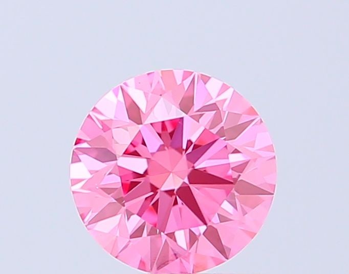 Ideal Loose Diamond - ROUND 0.83ct Fancy Vivid Pink VS1: Ideal Loose Diamond - ROUND 0.83ct Fancy Vivid Pink VS1 Source: This is a real non-mined Diamond that has been grown in a lab Shape: ROUND Carats: 0.83 Color: Fancy Vivid Pink Certification: IGI Video