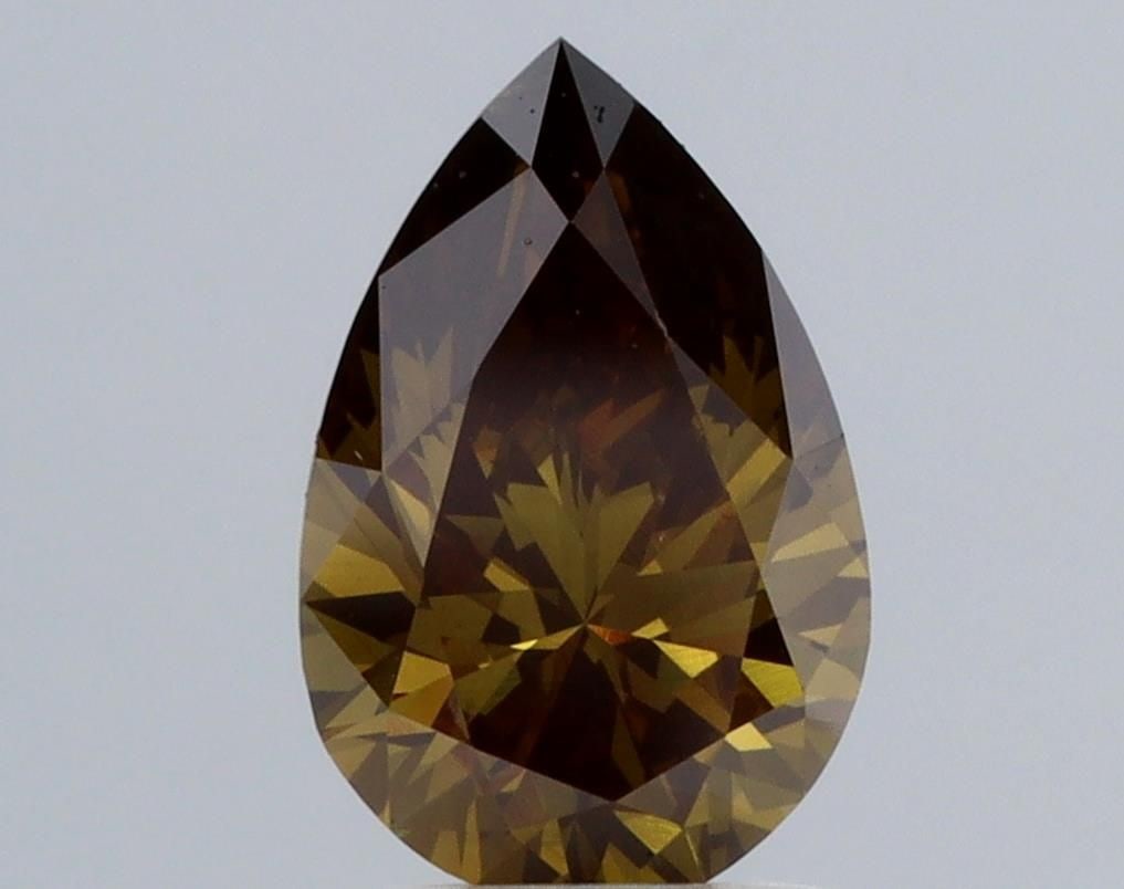 Loose Diamond - PEAR 1.56ct Brown VS1: Loose Diamond - PEAR 1.56ct Brown VS1 Source: This is a real non-mined Diamond that has been grown in a lab Shape: PEAR Carats: 1.56 Color: Brown Certification: NONE Video: