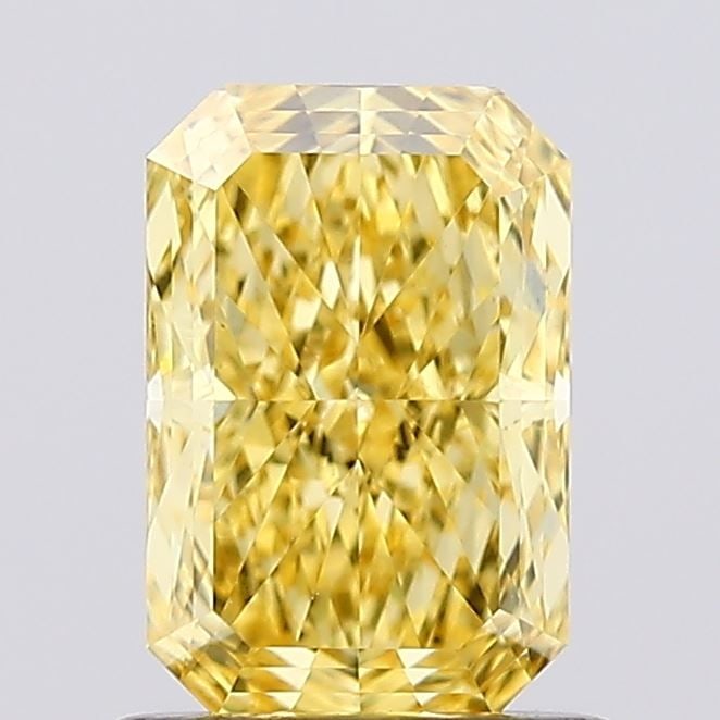 Loose Diamond - RADIANT 1.02ct Fancy Vivid Yellow VS1: Loose Diamond - RADIANT 1.02ct Fancy Vivid Yellow VS1 Source: This is a real non-mined Diamond that has been grown in a lab Shape: RADIANT Carats: 1.02 Color: Fancy Vivid Yellow Certification: IGI Vid