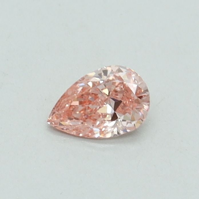 Loose Diamond - PEAR 0.21ct Fancy Vivid Pink VS1: Loose Diamond - PEAR 0.21ct Fancy Vivid Pink VS1 Source: This is a real non-mined Diamond that has been grown in a lab Shape: PEAR Carats: 0.21 Color: Fancy Vivid Pink Certification: IGI Video: