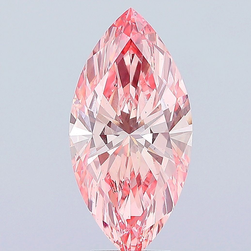 Loose Diamond - MARQUISE 5.22ct Fancy Vivid Pink VS2: Loose Diamond - MARQUISE 5.22ct Fancy Vivid Pink VS2 Source: This is a real non-mined Diamond that has been grown in a lab Shape: MARQUISE Carats: 5.22 Color: Fancy Vivid Pink Certification: IGI Video