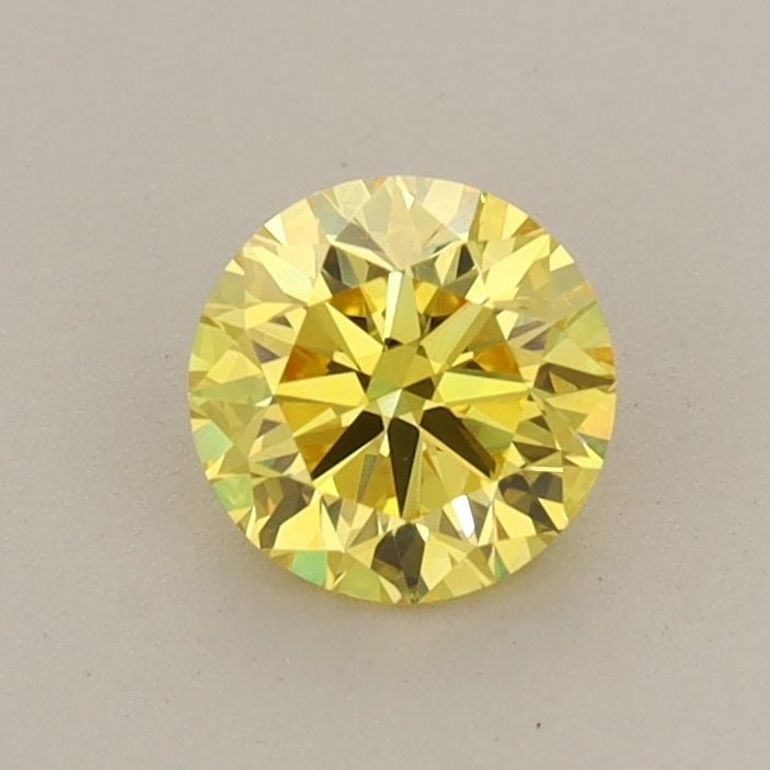 Loose Diamond - ROUND 0.6ct Fancy Vivid Yellow VS1: Loose Diamond - ROUND 0.6ct Fancy Vivid Yellow VS1 Source: This is a real non-mined Diamond that has been grown in a lab Shape: ROUND Carats: 0.6 Color: Fancy Vivid Yellow Certification: IGI Video:
