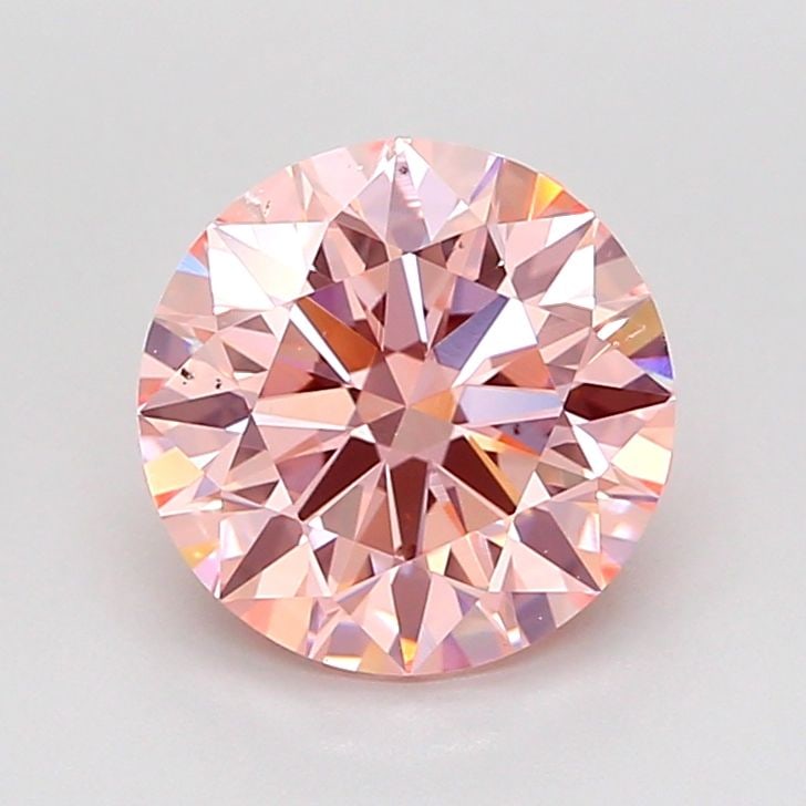Loose Diamond - ROUND 2.0ct Fancy Vivid Pink VS2: Loose Diamond - ROUND 2.0ct Fancy Vivid Pink VS2 Source: This is a real non-mined Diamond that has been grown in a lab Shape: ROUND Carats: 2.0 Color: Fancy Vivid Pink Certification: IGI Video: