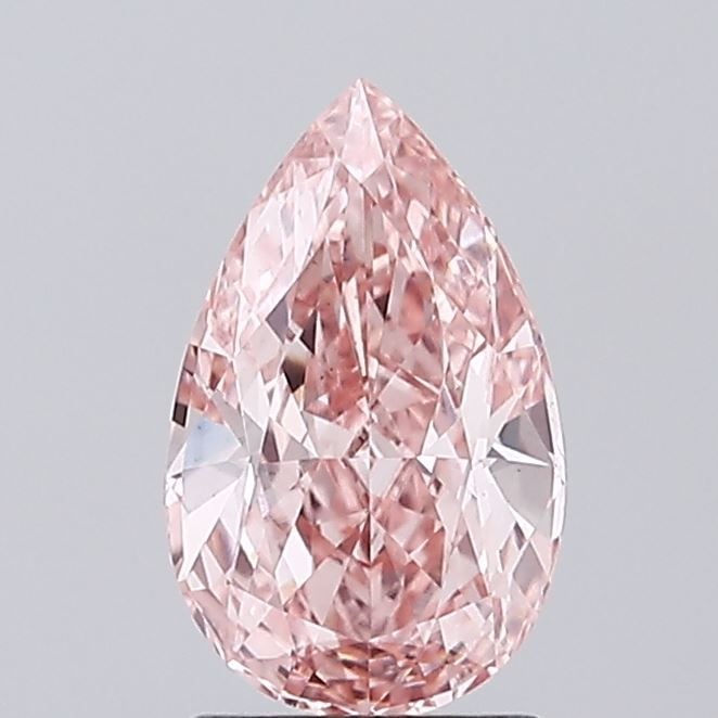 Loose Diamond - PEAR 1.4ct Fancy Vivid Pink VS1: Loose Diamond - PEAR 1.4ct Fancy Vivid Pink VS1 Source: This is a real non-mined Diamond that has been grown in a lab Shape: PEAR Carats: 1.4 Color: Fancy Vivid Pink Certification: IGI Video: