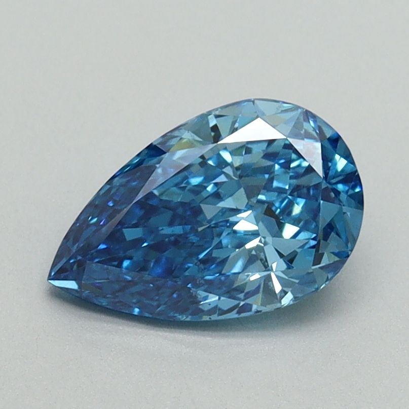Loose Diamond - PEAR 1.04ct Fancy Vivid Blue VS2: Loose Diamond - PEAR 1.04ct Fancy Vivid Blue VS2 Source: This is a real non-mined Diamond that has been grown in a lab Shape: PEAR Carats: 1.04 Color: Fancy Vivid Blue Certification: IGI Video: