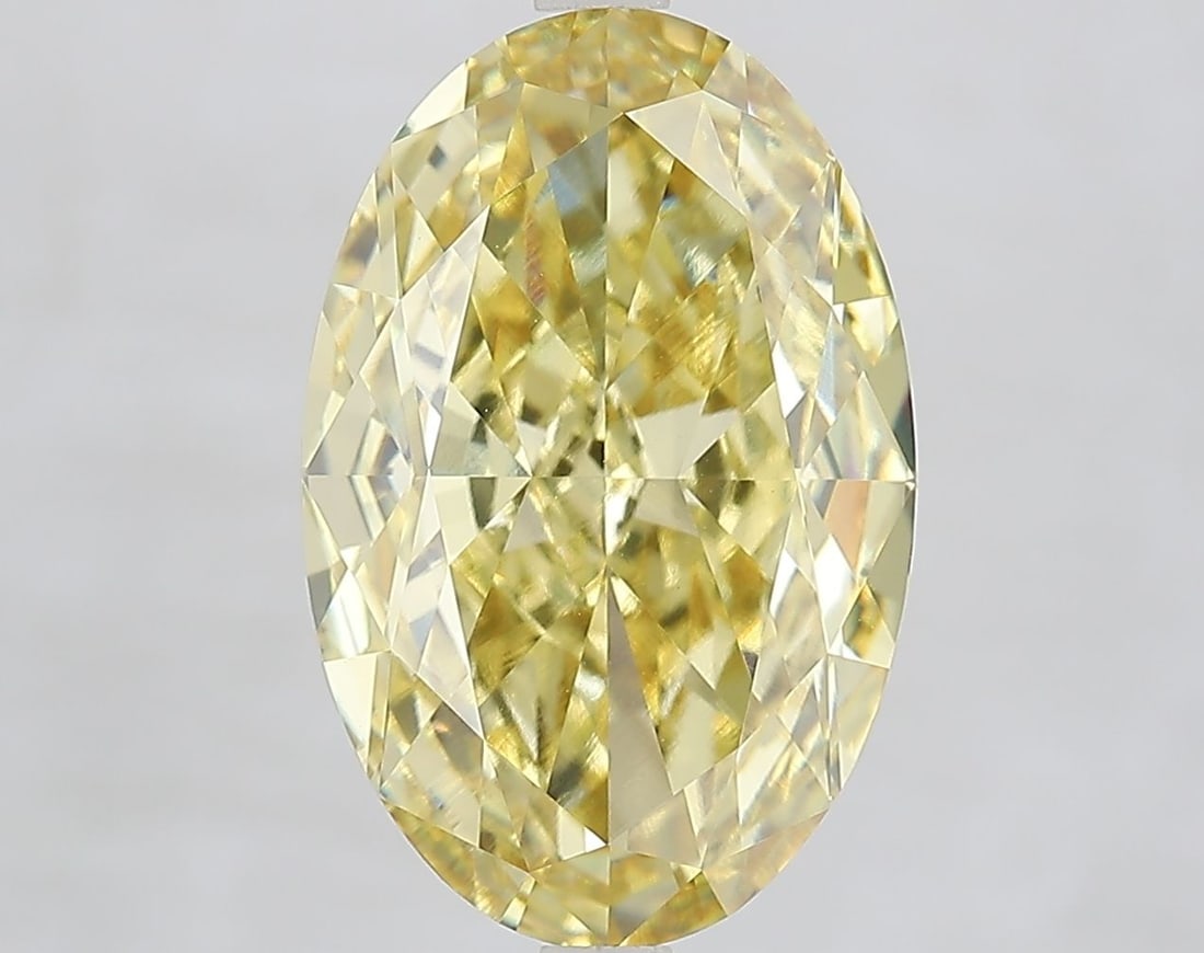 Loose Diamond - OVAL 7.1ct Fancy Vivid Yellow VVS2: Loose Diamond - OVAL 7.1ct Fancy Vivid Yellow VVS2 Source: This is a real non-mined Diamond that has been grown in a lab Shape: OVAL Carats: 7.1 Color: Fancy Vivid Yellow Certification: IGI Video: