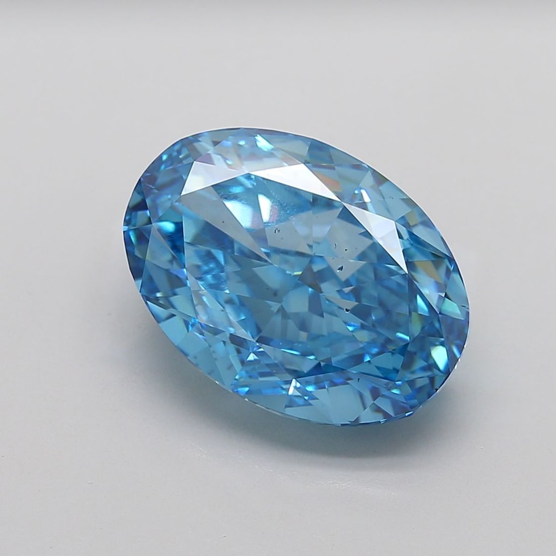 Loose Diamond - OVAL 12.03ct Fancy Vivid Blue VS2: Loose Diamond - OVAL 12.03ct Fancy Vivid Blue VS2 Source: This is a real non-mined Diamond that has been grown in a lab Shape: OVAL Carats: 12.03 Color: Fancy Vivid Blue Certification: IGI Video: