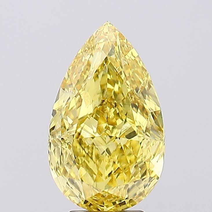 Loose Diamond - PEAR 5.55ct Fancy Vivid Yellow VS2: Loose Diamond - PEAR 5.55ct Fancy Vivid Yellow VS2 Source: This is a real non-mined Diamond that has been grown in a lab Shape: PEAR Carats: 5.55 Color: Fancy Vivid Yellow Certification: IGI Video: