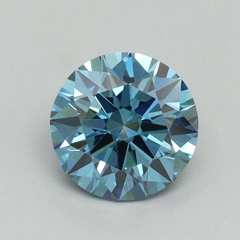 Ideal Loose Diamond - ROUND 1.13ct Fancy Vivid Blue VS1: Ideal Loose Diamond - ROUND 1.13ct Fancy Vivid Blue VS1 Source: This is a real non-mined Diamond that has been grown in a lab Shape: ROUND Carats: 1.13 Color: Fancy Vivid Blue Certification: IGI Video