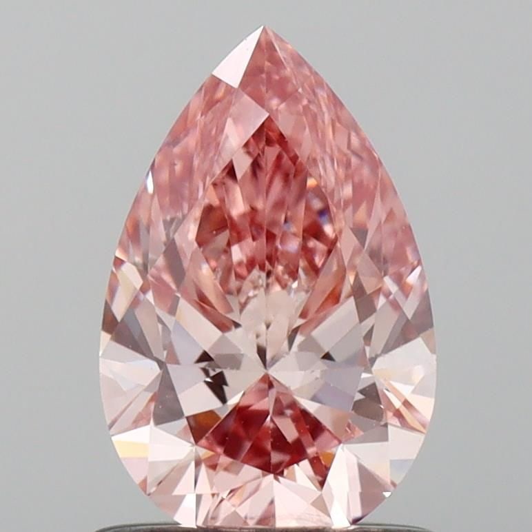 Loose Diamond - PEAR 0.79ct Fancy Vivid Pink VS2: Loose Diamond - PEAR 0.79ct Fancy Vivid Pink VS2 Source: This is a real non-mined Diamond that has been grown in a lab Shape: PEAR Carats: 0.79 Color: Fancy Vivid Pink Certification: IGI Video: