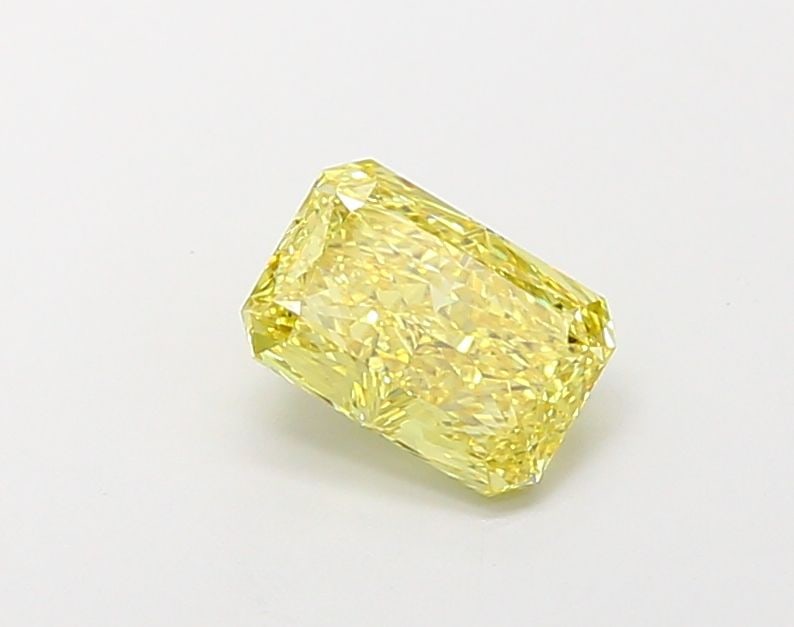 Loose Diamond - RADIANT 1.29ct Fancy Vivid Yellow VS1: Loose Diamond - RADIANT 1.29ct Fancy Vivid Yellow VS1 Source: This is a real non-mined Diamond that has been grown in a lab Shape: RADIANT Carats: 1.29 Color: Fancy Vivid Yellow Certification: IGI Vid