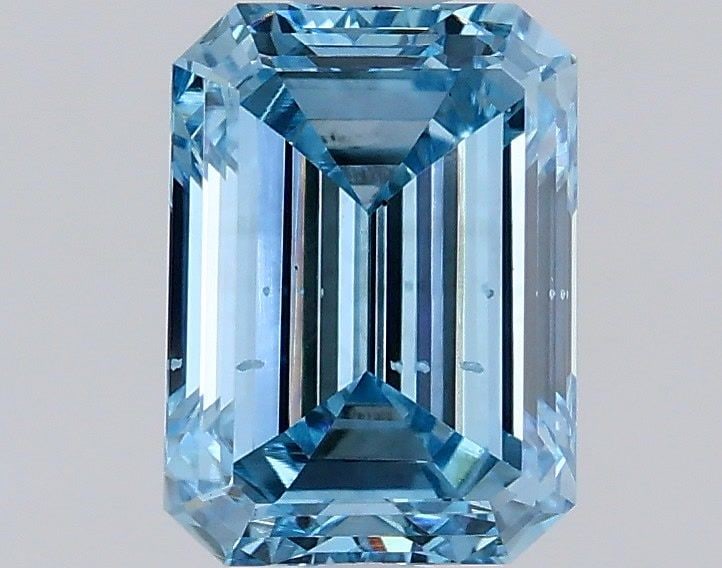 Loose Diamond - EMERALD 0.98ct Fancy Vivid Blue VS2: Loose Diamond - EMERALD 0.98ct Fancy Vivid Blue VS2 Source: This is a real non-mined Diamond that has been grown in a lab Shape: EMERALD Carats: 0.98 Color: Fancy Vivid Blue Certification: IGI Video: