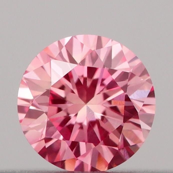 Loose Diamond - ROUND 0.18ct Fancy Vivid Pink VVS2: Loose Diamond - ROUND 0.18ct Fancy Vivid Pink VVS2 Source: This is a real non-mined Diamond that has been grown in a lab Shape: ROUND Carats: 0.18 Color: Fancy Vivid Pink Certification: IGI Video: