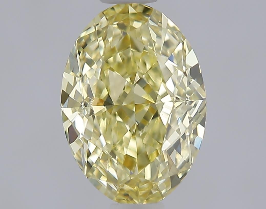 Loose Diamond - OVAL 1.51ct Fancy Yellow VVS2: Loose Diamond - OVAL 1.51ct Fancy Yellow VVS2 Source: This is a real non-mined Diamond that has been grown in a lab Shape: OVAL Carats: 1.51 Color: Fancy Yellow Certification: IGI Video: