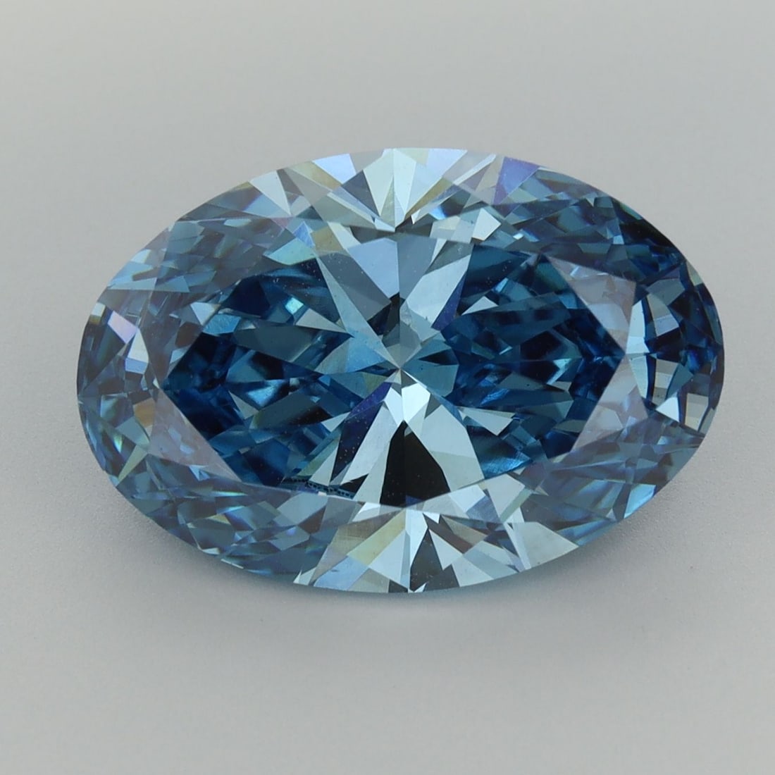 Loose Diamond - OVAL 6.46ct Fancy Vivid Blue VS1: Loose Diamond - OVAL 6.46ct Fancy Vivid Blue VS1 Source: This is a real non-mined Diamond that has been grown in a lab Shape: OVAL Carats: 6.46 Color: Fancy Vivid Blue Certification: IGI Video: