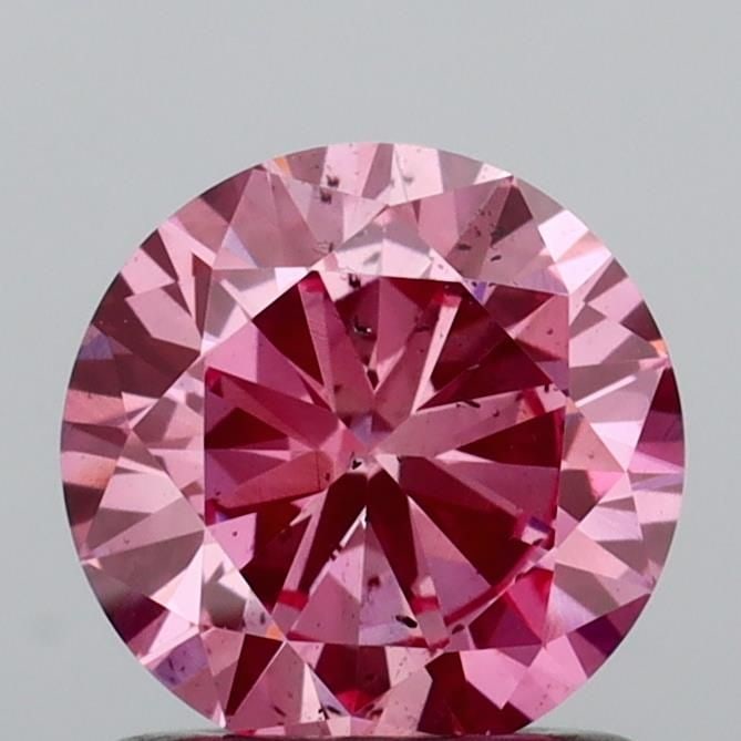 Loose Diamond - ROUND 1.0ct Fancy Vivid Pink SI1: Loose Diamond - ROUND 1.0ct Fancy Vivid Pink SI1 Source: This is a real non-mined Diamond that has been grown in a lab Shape: ROUND Carats: 1.0 Color: Fancy Vivid Pink Certification: IGI Video: