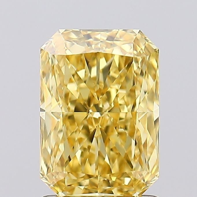 Loose Diamond - RADIANT 1.64ct Fancy Vivid Yellow VVS2: Loose Diamond - RADIANT 1.64ct Fancy Vivid Yellow VVS2 Source: This is a real non-mined Diamond that has been grown in a lab Shape: RADIANT Carats: 1.64 Color: Fancy Vivid Yellow Certification: IGI Vi