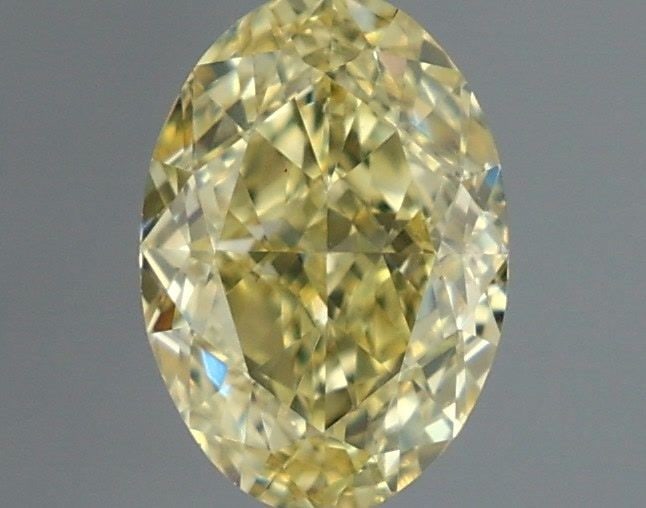 Loose Diamond - OVAL 1.02ct Fancy Yellow VS1: Loose Diamond - OVAL 1.02ct Fancy Yellow VS1 Source: This is a real non-mined Diamond that has been grown in a lab Shape: OVAL Carats: 1.02 Color: Fancy Yellow Certification: IGI Video: