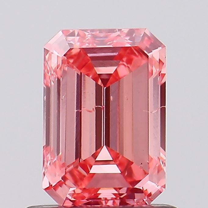 Loose Diamond - EMERALD 1.01ct Fancy Vivid Pink SI2: Loose Diamond - EMERALD 1.01ct Fancy Vivid Pink SI2 Source: This is a real non-mined Diamond that has been grown in a lab Shape: EMERALD Carats: 1.01 Color: Fancy Vivid Pink Certification: IGI Video: