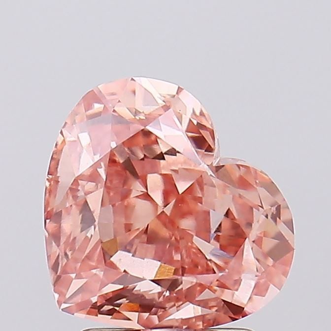 Loose Diamond - HEART 2.69ct Fancy Vivid Orange Pink VS1: Loose Diamond - HEART 2.69ct Fancy Vivid Orange Pink VS1 Source: This is a real non-mined Diamond that has been grown in a lab Shape: HEART Carats: 2.69 Color: Fancy Vivid Orange Pink Certification: