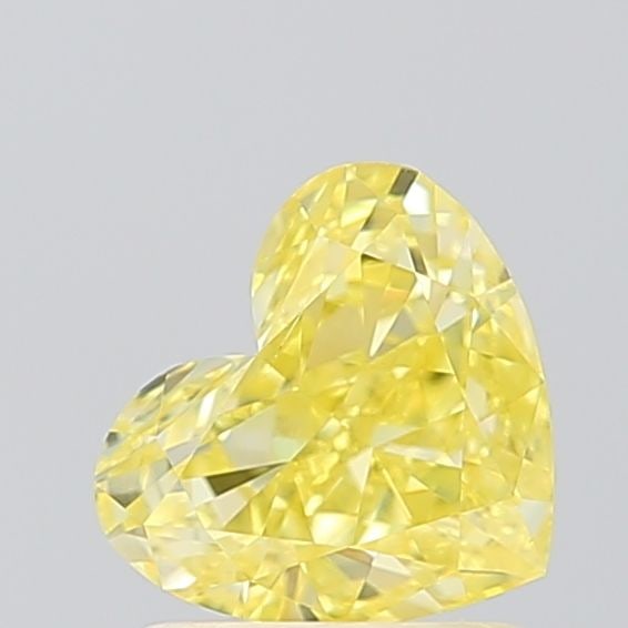 Loose Diamond - HEART 1.01ct Fancy Vivid Yellow VS2: Loose Diamond - HEART 1.01ct Fancy Vivid Yellow VS2 Source: This is a real non-mined Diamond that has been grown in a lab Shape: HEART Carats: 1.01 Color: Fancy Vivid Yellow Certification: IGI Video: