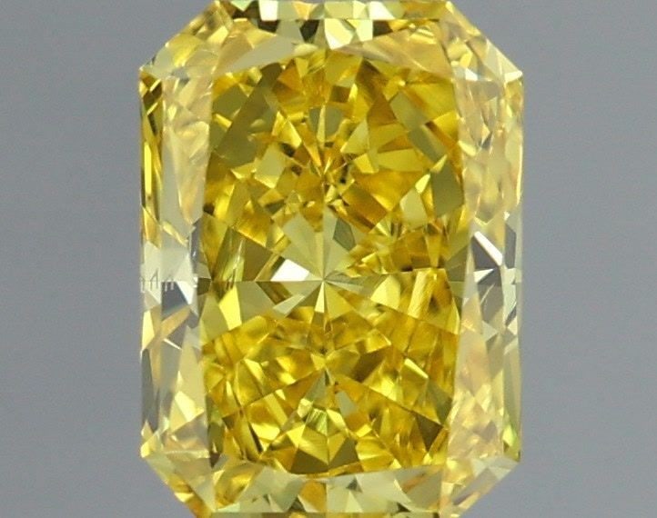 Loose Diamond - RADIANT 1.0ct Fancy Vivid Yellow SI1: Loose Diamond - RADIANT 1.0ct Fancy Vivid Yellow SI1 Source: This is a real non-mined Diamond that has been grown in a lab Shape: RADIANT Carats: 1.0 Color: Fancy Vivid Yellow Certification: IGI Addit