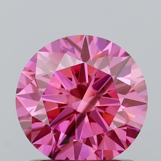 Ideal Loose Diamond - ROUND 1.06ct Fancy Vivid Pink SI2: Ideal Loose Diamond - ROUND 1.06ct Fancy Vivid Pink SI2 Source: This is a real non-mined Diamond that has been grown in a lab Shape: ROUND Carats: 1.06 Color: Fancy Vivid Pink Certification: IGI Video