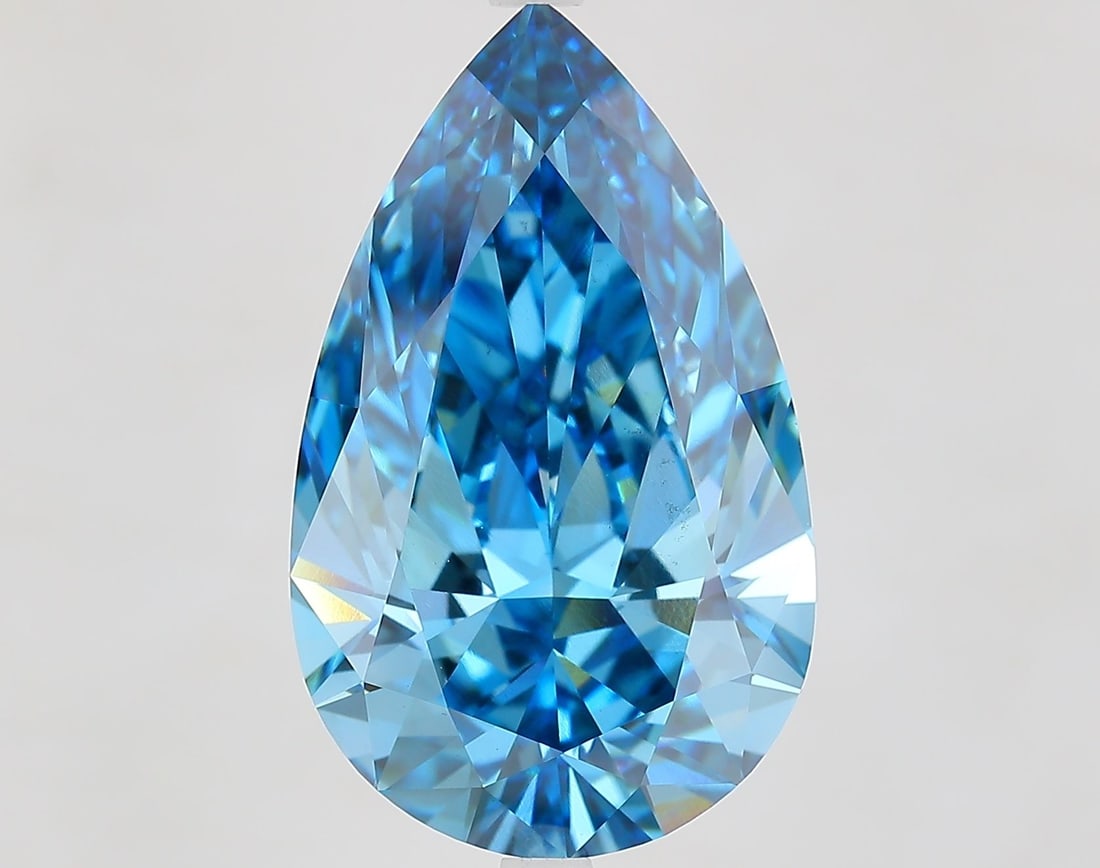 Loose Diamond - PEAR 10.02ct Fancy Vivid Blue VS1: Loose Diamond - PEAR 10.02ct Fancy Vivid Blue VS1 Source: This is a real non-mined Diamond that has been grown in a lab Shape: PEAR Carats: 10.02 Color: Fancy Vivid Blue Certification: IGI Video:
