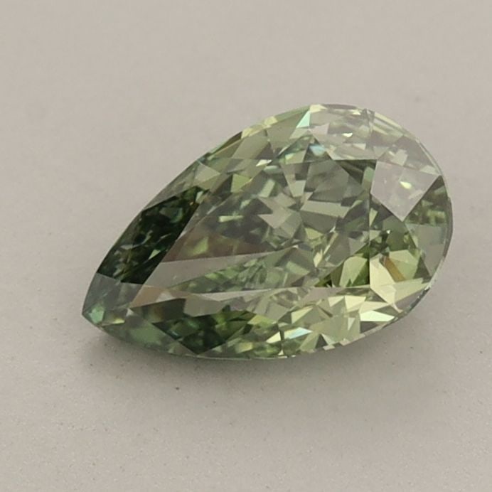 Loose Diamond - PEAR 0.83ct Fancy Vivid Green VVS2: Loose Diamond - PEAR 0.83ct Fancy Vivid Green VVS2 Source: This is a real non-mined Diamond that has been grown in a lab Shape: PEAR Carats: 0.83 Color: Fancy Vivid Green Certification: IGI Video: