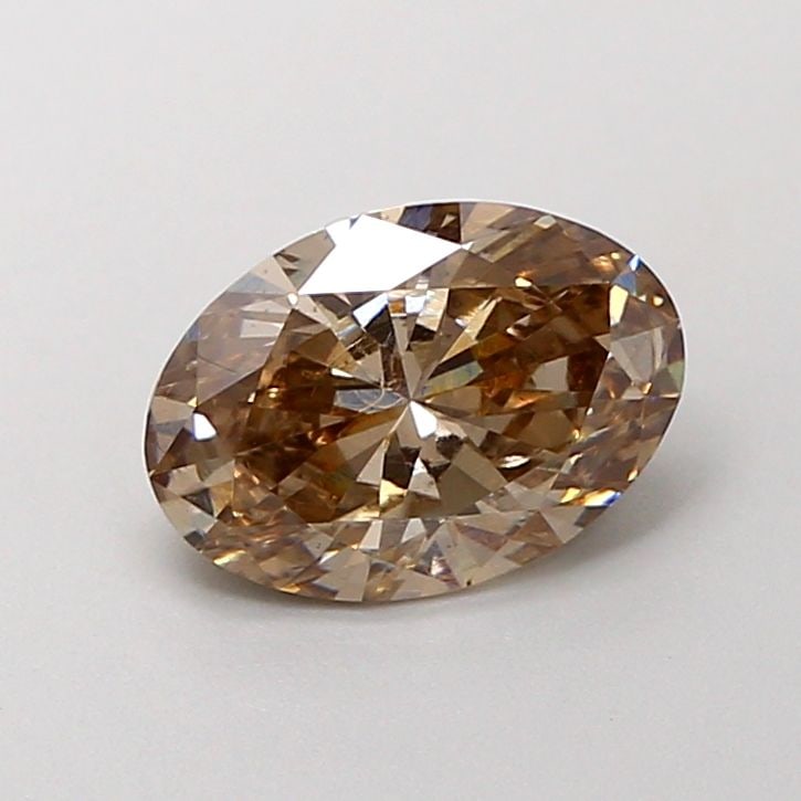 Loose Diamond - OVAL 1.24ct Fancy Light Brown VS1: Loose Diamond - OVAL 1.24ct Fancy Light Brown VS1 Source: This is a real non-mined Diamond that has been grown in a lab Shape: OVAL Carats: 1.24 Color: Fancy Light Brown Certification: IGI Video:
